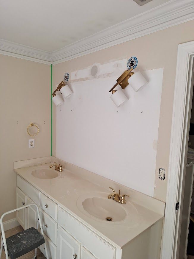 The Process of Repairing and Painting a Wall in Alpharetta, GA