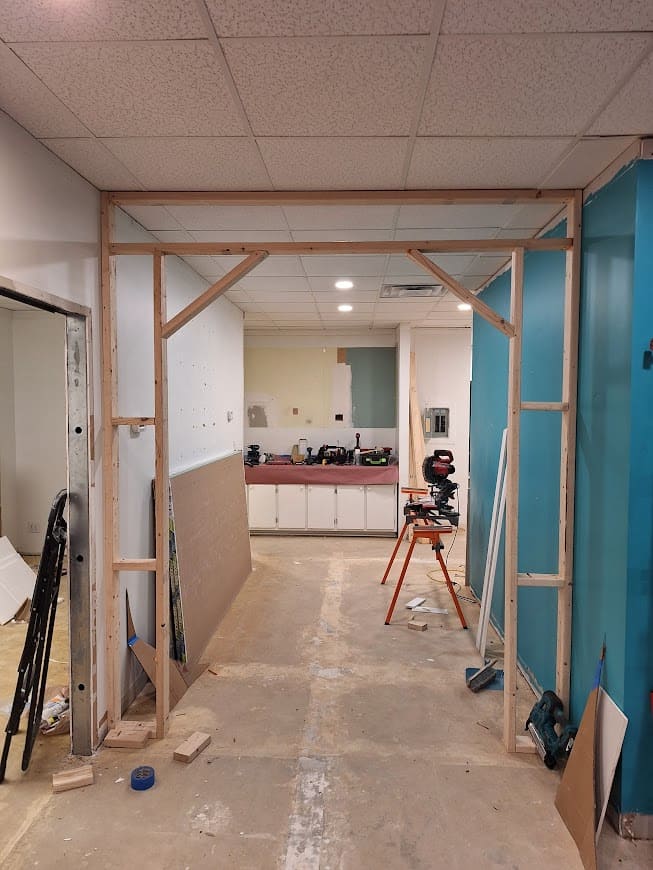 Custom timber frame for arched doorway construction