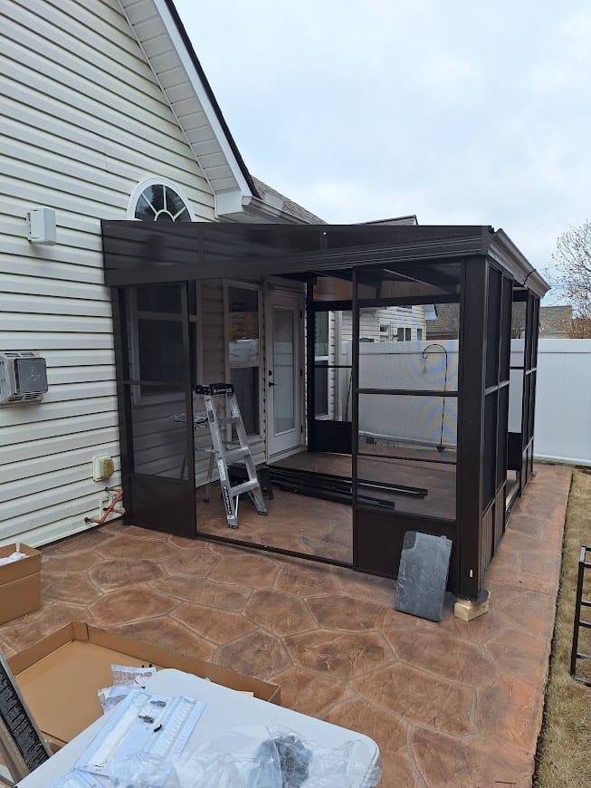 Completed gazebo structure with sliding doors in Roswell GA