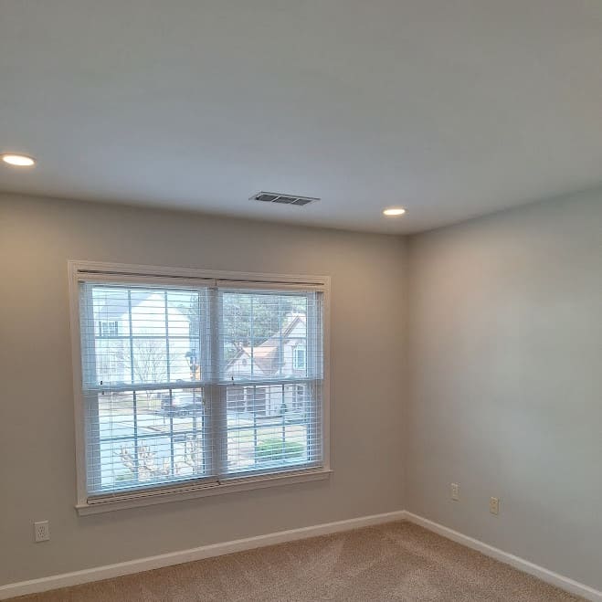 Smooth ceiling after popcorn texture removal and painting