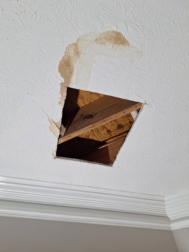 Ceiling drywall hole repair before patching Roswell GA